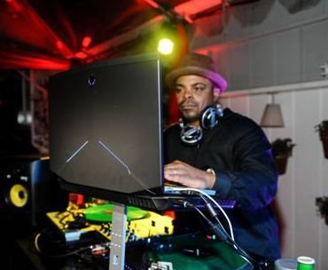 DJ using Alienware system to play music at Grammy after party