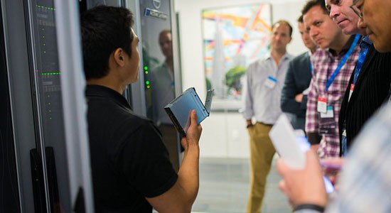 Visitors to Dell's IoT Lab in Santa Clara, California, view a demonstration of the Dell IoT Gateway