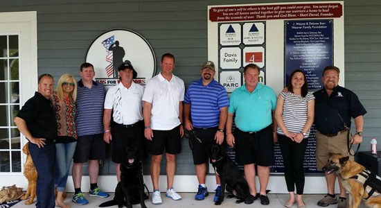  The Dell Support team with K9s for Warrior staff personnel at the K9s for Warriors 2 weeks before the facility opens. 