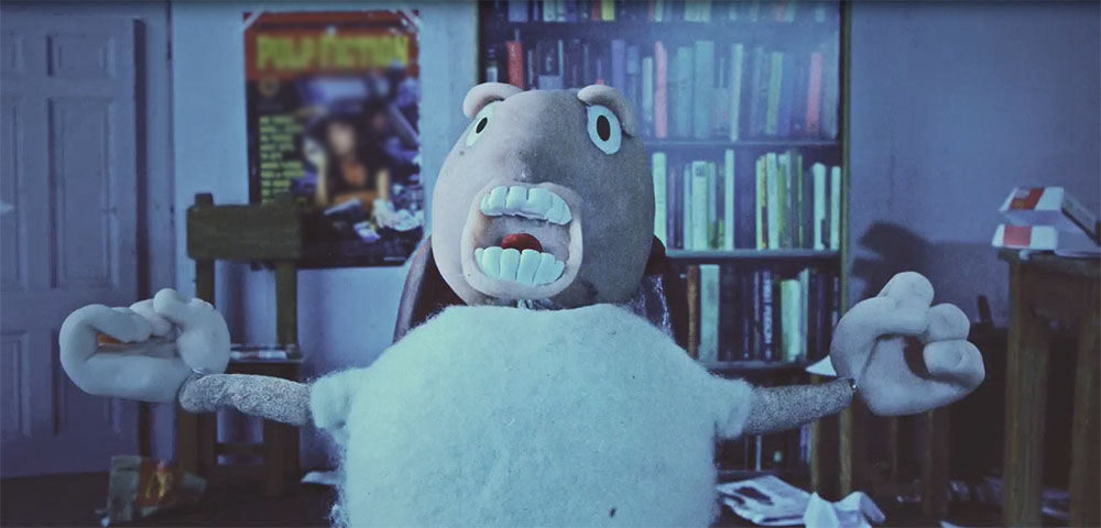 frame from stop motion short with man yelling in frustration