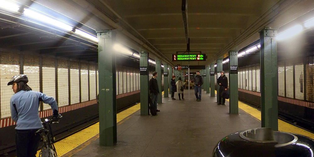 people waiting for a subway train